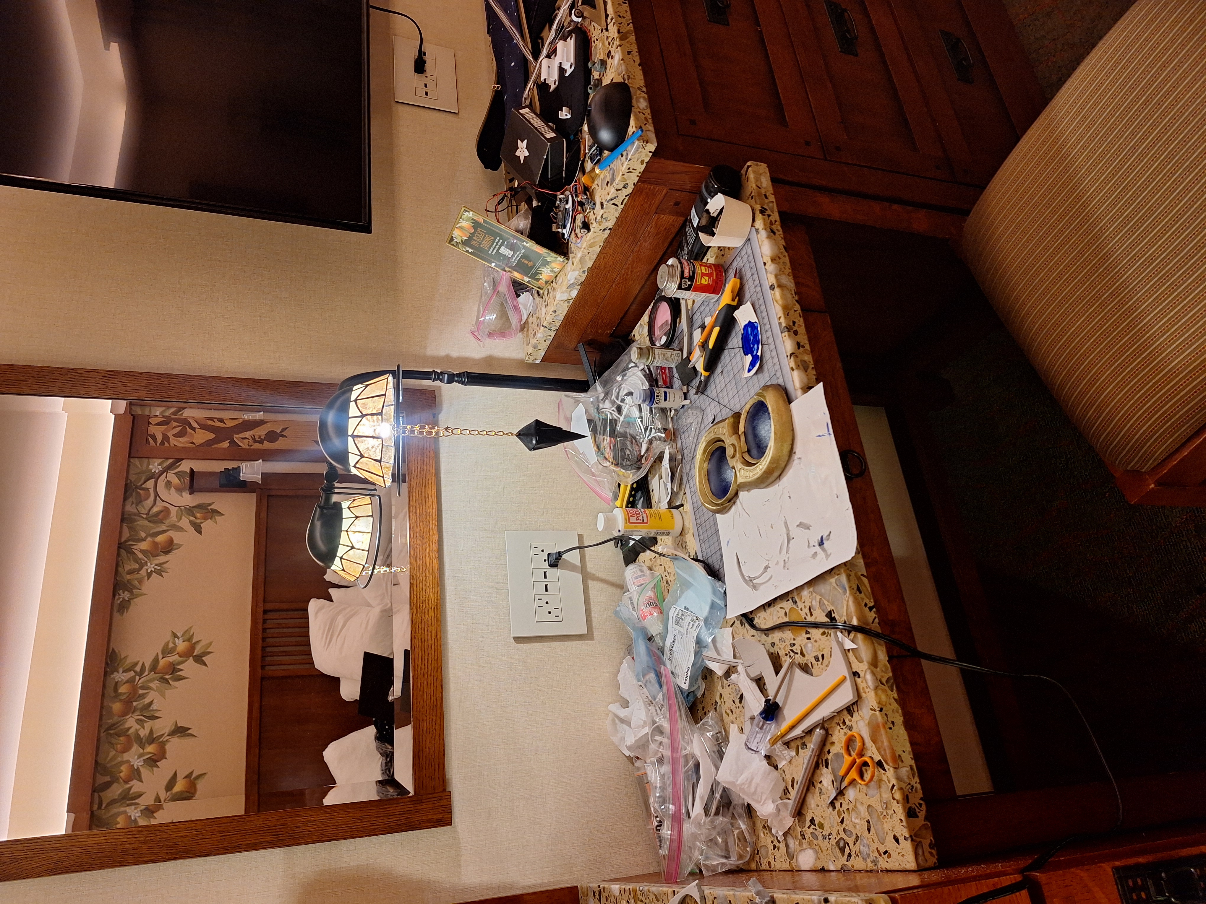 Cosplay construction taking over the hotel desk.