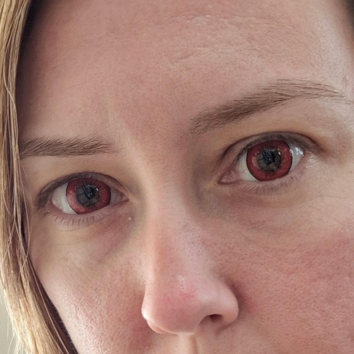 Ashe's red contacts